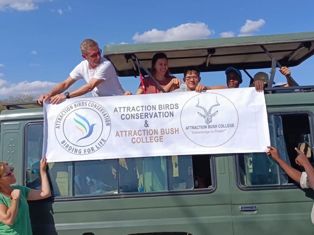 Safari vehicle with both organisation banners