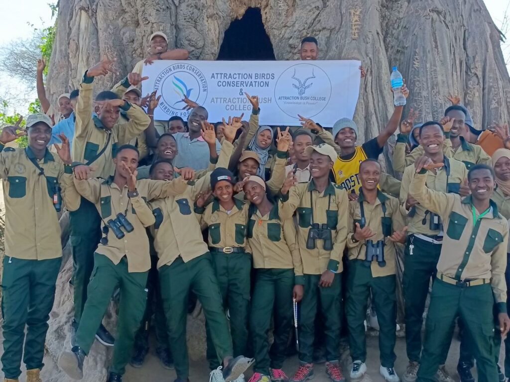 ABC and Attraction Bush College banner at a baobab